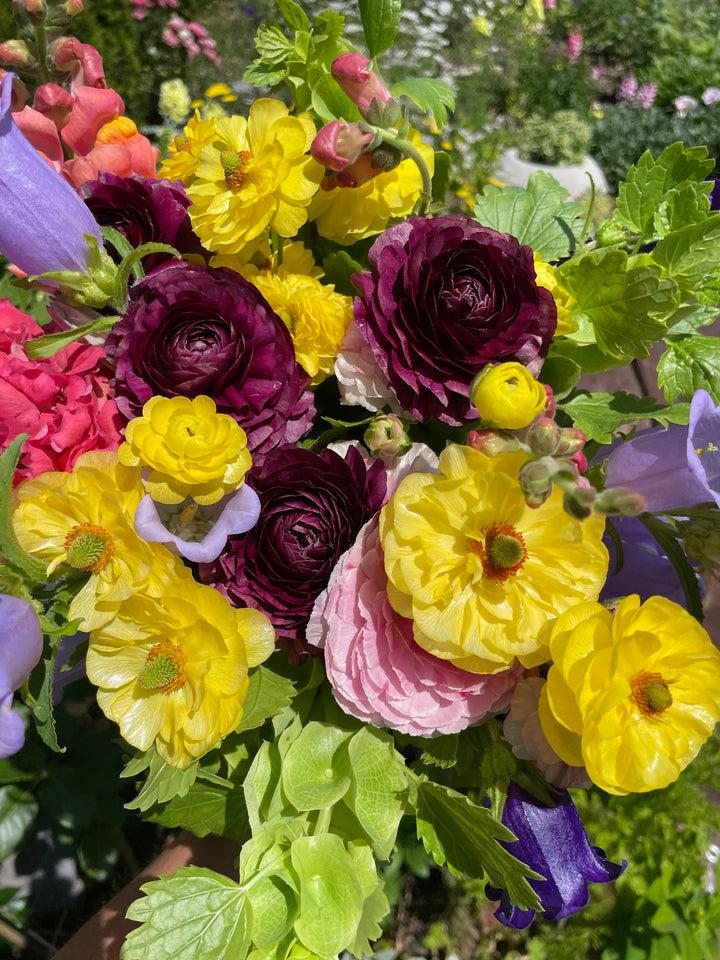 a bunch of flowers that are in a vase