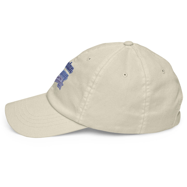 Side view of a beige pastel baseball hat made from 100% chino cotton by The Happy Hour Flowers, showcasing the Tartan Army emblem for Scotland&